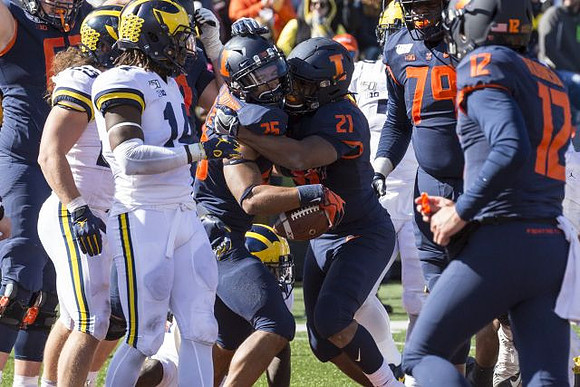 Jordan Glasgow (29) and Josh Metellus (14)