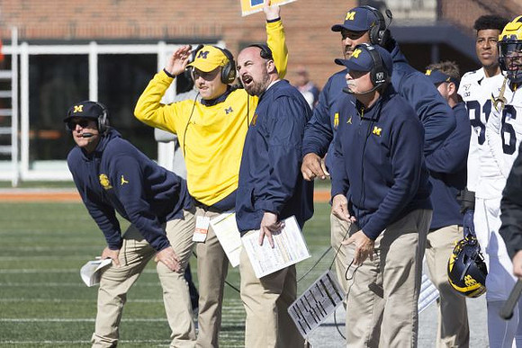 Jim Harbaugh, Chris Partridge, Shaun Nua, and Don Brown
