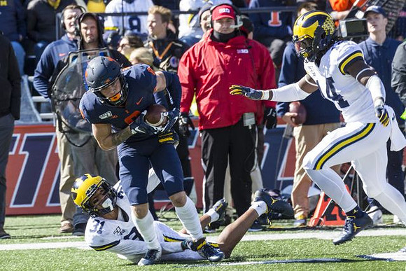 Vincent Gray (31) and Josh Metellus (14)