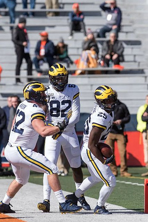 Ben Mason (42), Nick Eubanks (82), and Hassan Haskins (25)