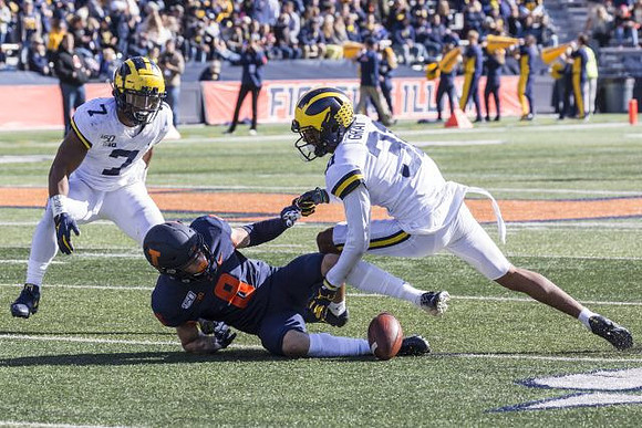 Khaleke Hudson (7) and Vincent Gray (31)