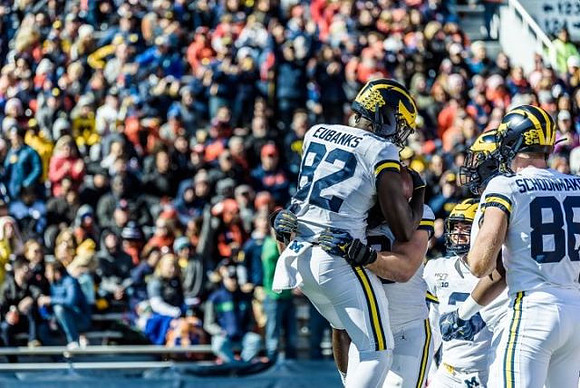 Nick Eubanks (82), Ben Mason (42), Shea Patterson (2), and Luke Schoonmaker (86)