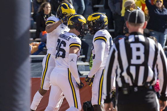 Ronnie Bell (8), Luke Schoonmaker (86), and Nick Eubanks (82)