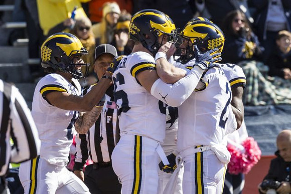 Ronnie Bell (8), Luke Schoonmaker (86), and Shea Patterson (2)