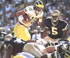 Tom Brady (10) and Jon Jansen (77)