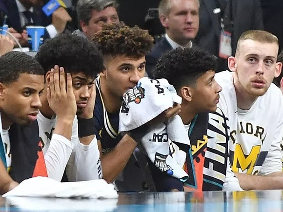 Jaaron Simmons (5), Ibi Watson (23), Isaiah Livers (4), Eli Brooks (55), and Austin Davis (51)