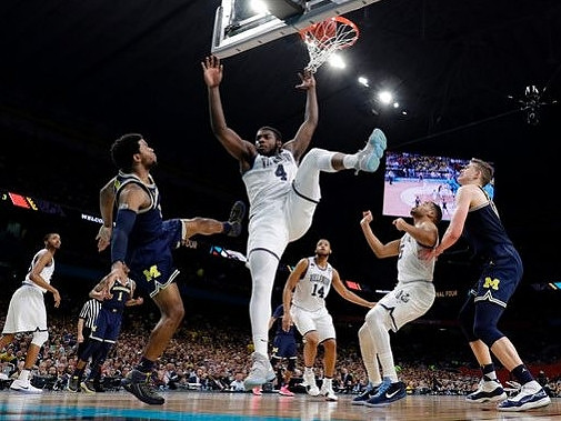Zavier Simpson (3), Charles Matthews (1), and Moritz Wagner (13)