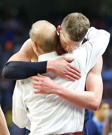 Moritz Wagner (13) and John Beilein