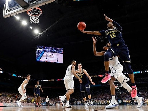 Zavier Simpson (3), Moritz Wagner (13), and Muhammad-Ali Abdur-Rahkman (12)