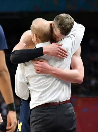 Moritz Wagner (13) and John Beilein