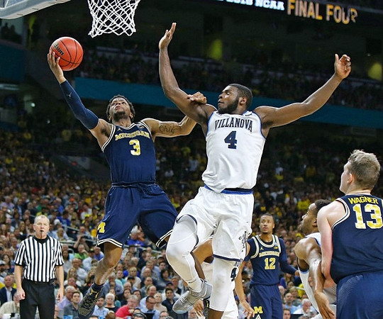 Zavier Simpson (3), Muhammad-Ali Abdur-Rahkman (12), and Moritz Wagner (13)
