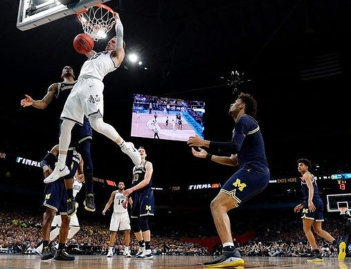 Charles Matthews (1), Moritz Wagner (13), Isaiah Livers (4), and Jordan Poole (2)