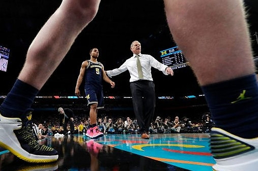 Jaaron Simmons (5) and John Beilein