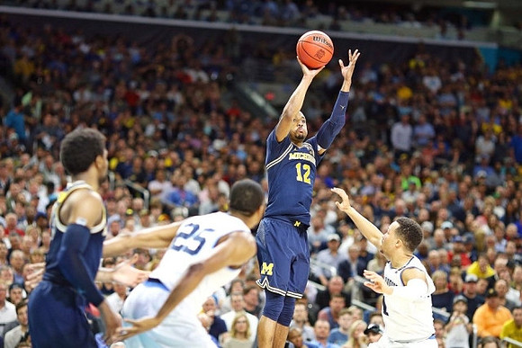 Zavier Simpson (3) and Muhammad-Ali Abdur-Rahkman (12)