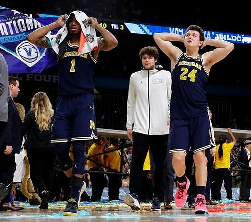 Charles Matthews (1), Brent Hibbitts (0), and C.J. Baird (24)