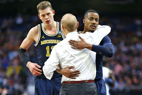 Moritz Wagner (13), Muhammad-Ali Abdur-Rahkman (12), and John Beilein