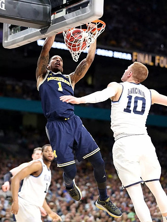 Charles Matthews (1) and Moritz Wagner (13)