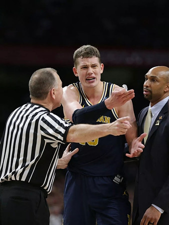 Moritz Wagner (13) and Saddi Washington