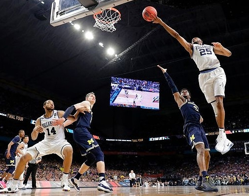 Muhammad-Ali Abdur-Rahkman (12), Moritz Wagner (13), and Zavier Simpson (3)