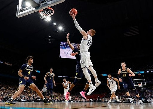 Isaiah Livers (4), Charles Matthews (1), Muhammad-Ali Abdur-Rahkman (12), and Moritz Wagner (13)