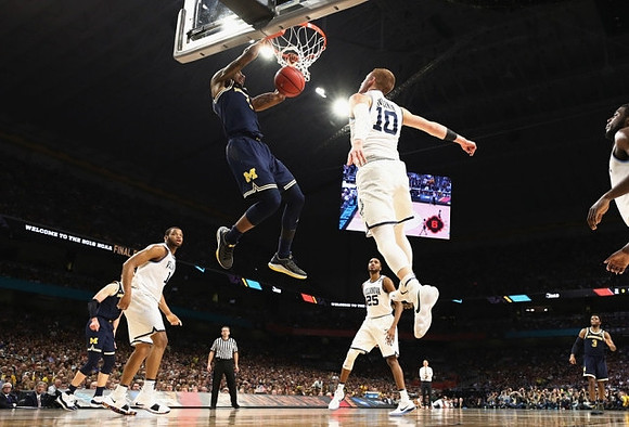 Charles Matthews (1) and Zavier Simpson (3)
