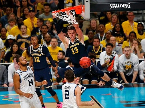 Muhammad-Ali Abdur-Rahkman (12) and Moritz Wagner (13)