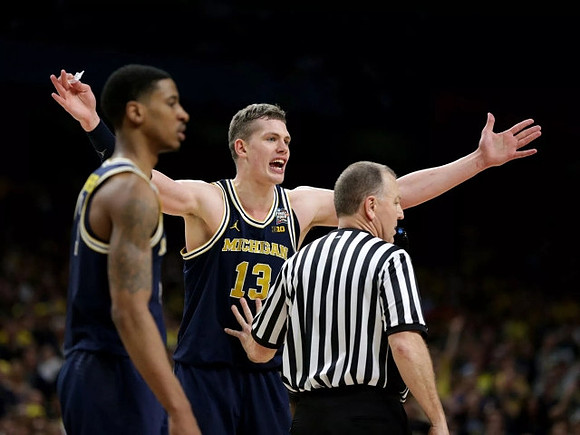 Charles Matthews (1) and Moritz Wagner (13)