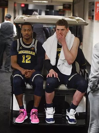 Muhammad-Ali Abdur-Rahkman (12) and Moritz Wagner (13)