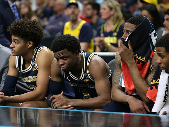 Jordan Poole (2), Zavier Simpson (3), Charles Matthews (1), and Jaaron Simmons (5)