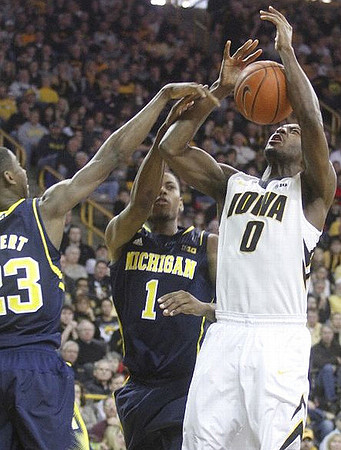 Caris LeVert (23) and Glenn Robinson III (1)
