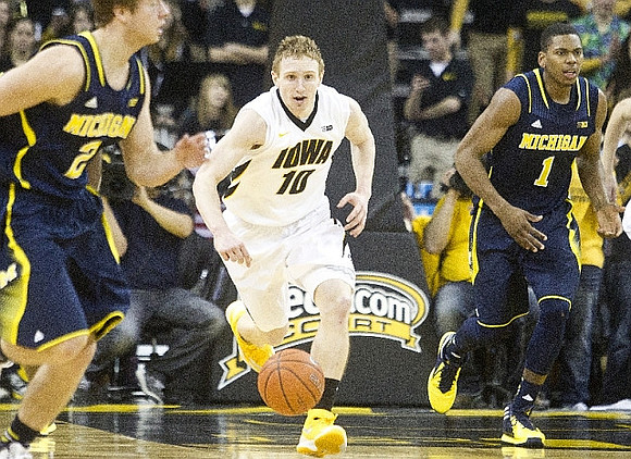 Spike Albrecht (2) and Glenn Robinson III (1)