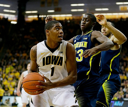 Caris LeVert (23) and Jon Horford (15)