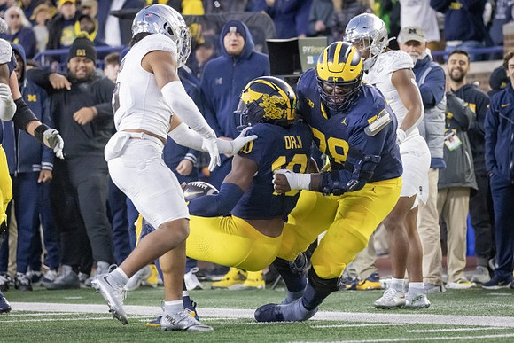 Alex Orji (10) and Myles Hinton (78)
