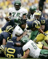 Tim Jamison (90), Darnell Hood (4), Brandon Harrison (27), and Grant Mason (13)