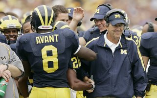Jason Avant (8), Lloyd Carr, and Jeff Kastl (13)