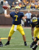 Chad Henne (7) and Max Martin (23)