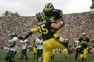 Steve Breaston (15), Brian Thompson (35), and Tyler Ecker (89)