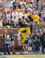 Steve Breaston (15) and Brian Thompson (35)