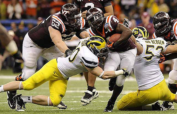 Jake Ryan (90) and Ryan Van Bergen (53)