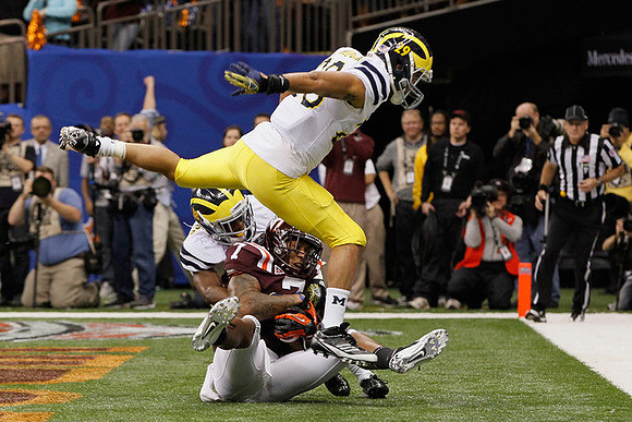 Blake Countess (18) and Troy Woolfolk (29)