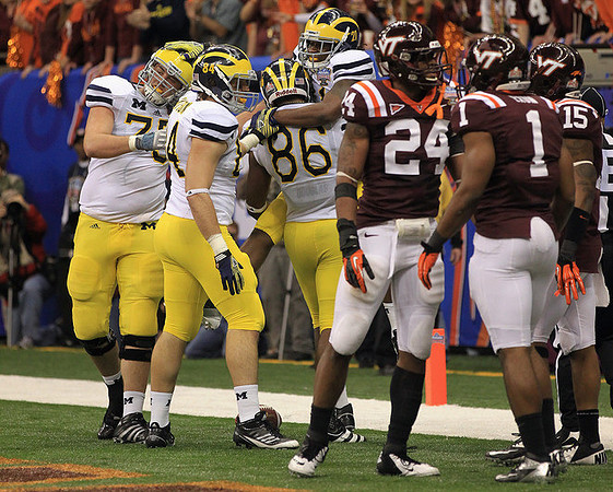 Michael Schofield (75), Steve Watson (84), Kevin Koger (86), and Junior Hemingway (21)