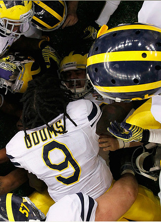 Elliott Mealer (57), Martavious Odoms (9), and Kevin Koger (86)