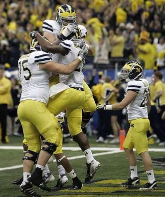 Michael Schofield (75), Junior Hemingway (21), and Drew Dileo (26)