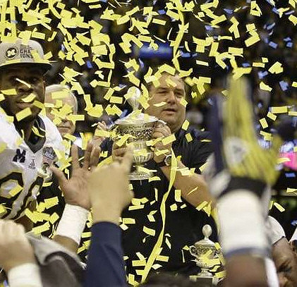 Kevin Koger (86) and Brady Hoke