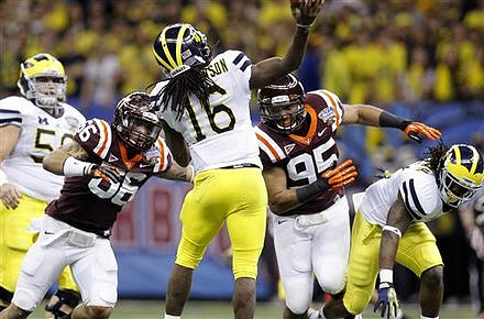 David Molk (50), Denard Robinson (16), and Vincent Smith (2)