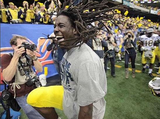 Denard Robinson (16) and Blake Countess (18)