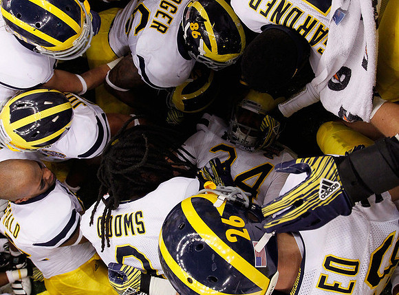 J.B. Fitzgerald (42), Martavious Odoms (9), Drew Dileo (26), Devin Gardner (7), and Kevin Koger (86)