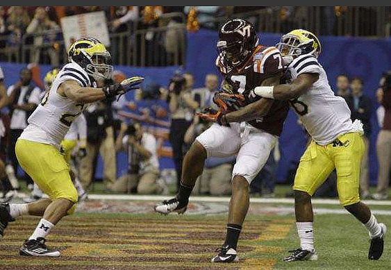 Troy Woolfolk (29) and Blake Countess (18)