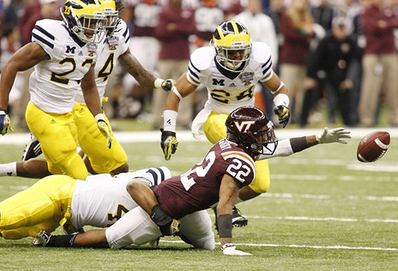 Cameron Gordon (4), Floyd Simmons (23), Josh Furman (14), and Delonte Hollowell (24)