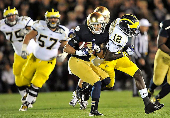 Michael Schofield (75), Elliott Mealer (57), and Devin Gardner (12)